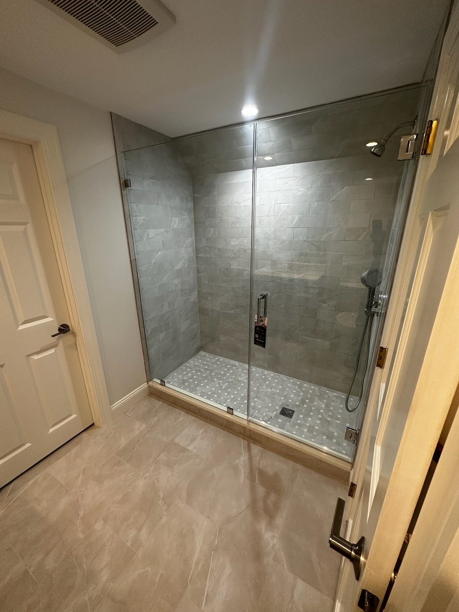 Semi-frameless tub enclosure Waltham MA chrome hardware